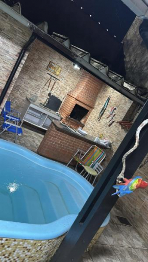 Casa inteira próximo a praia com piscina bertioga
